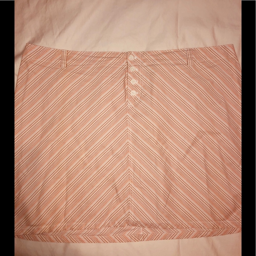 Venezia  skort . Orange and tan colored strips.